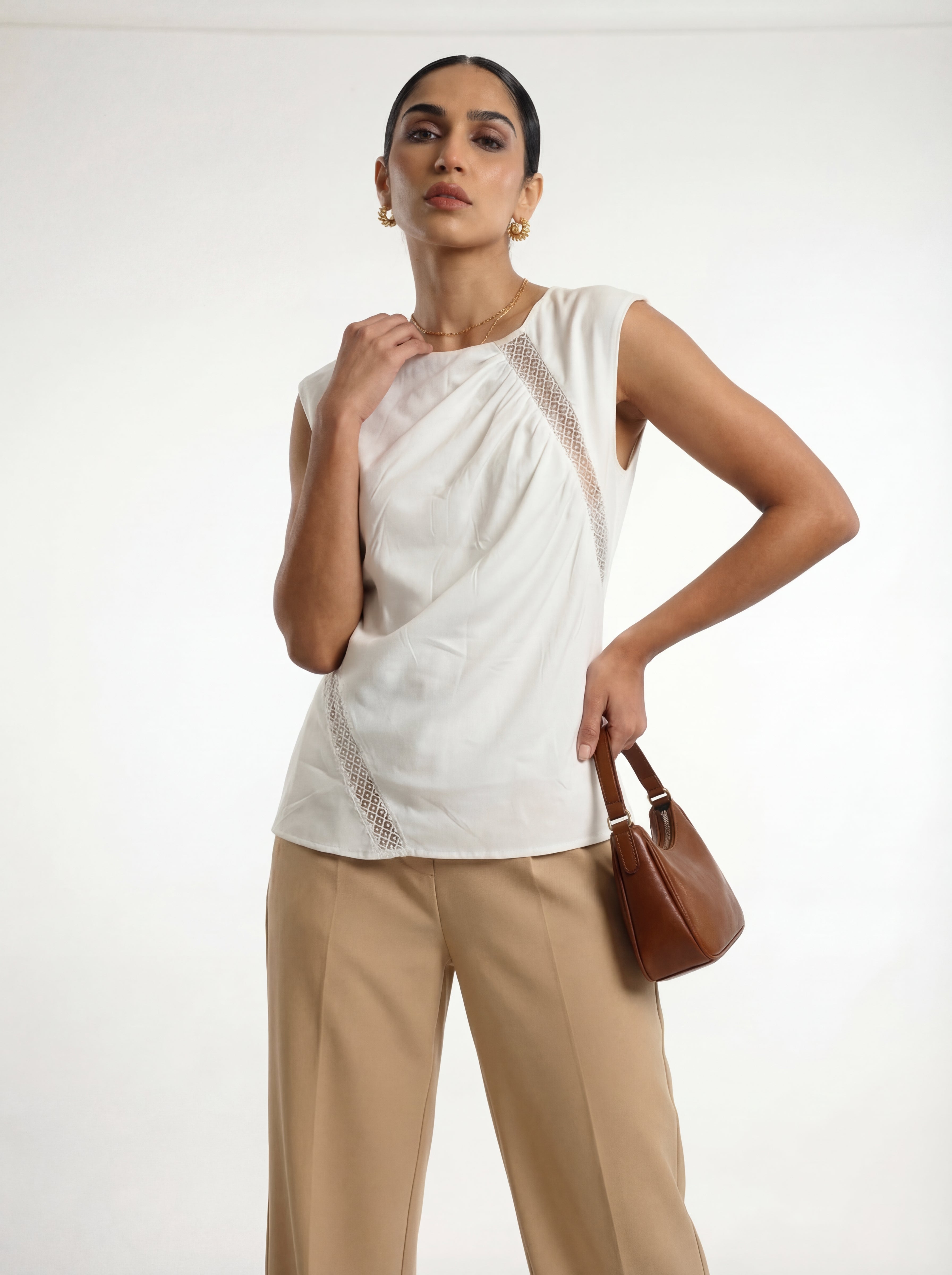 White Sleeveless Blouse