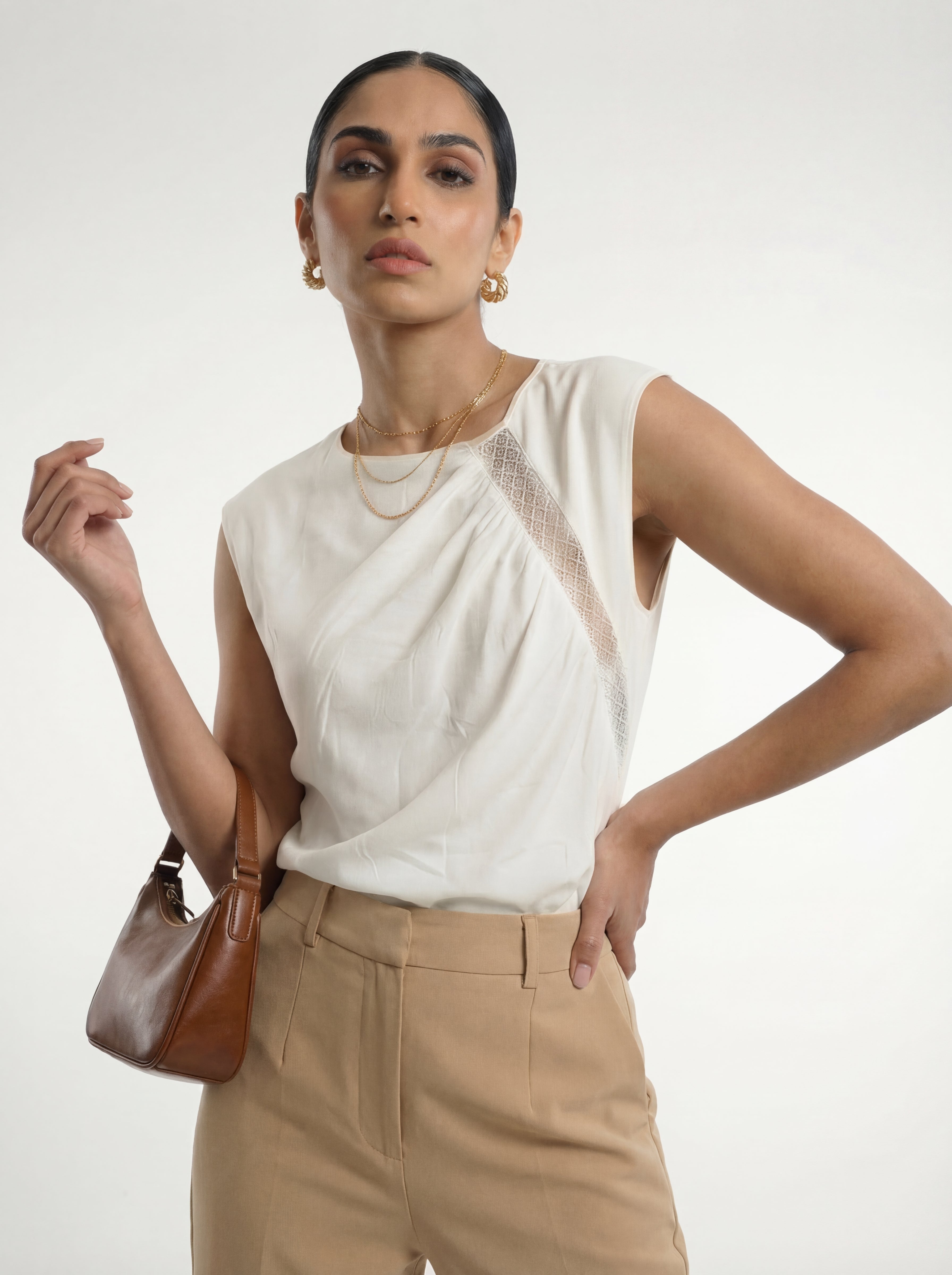 White Sleeveless Blouse